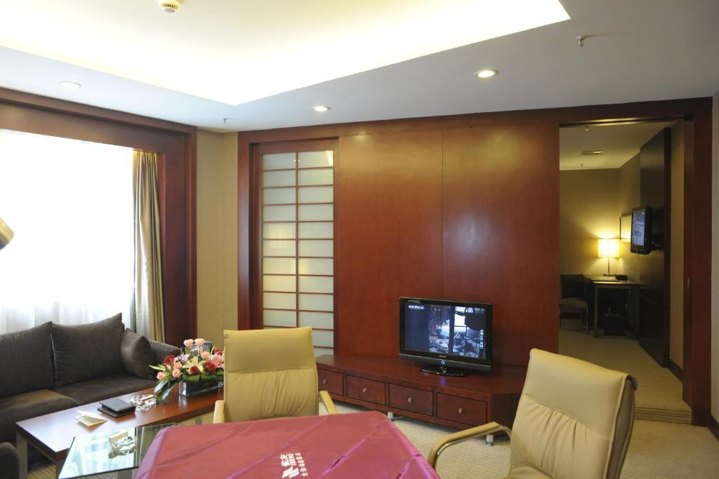 Wuhan Junyi Dynasty Hotel Номер фото